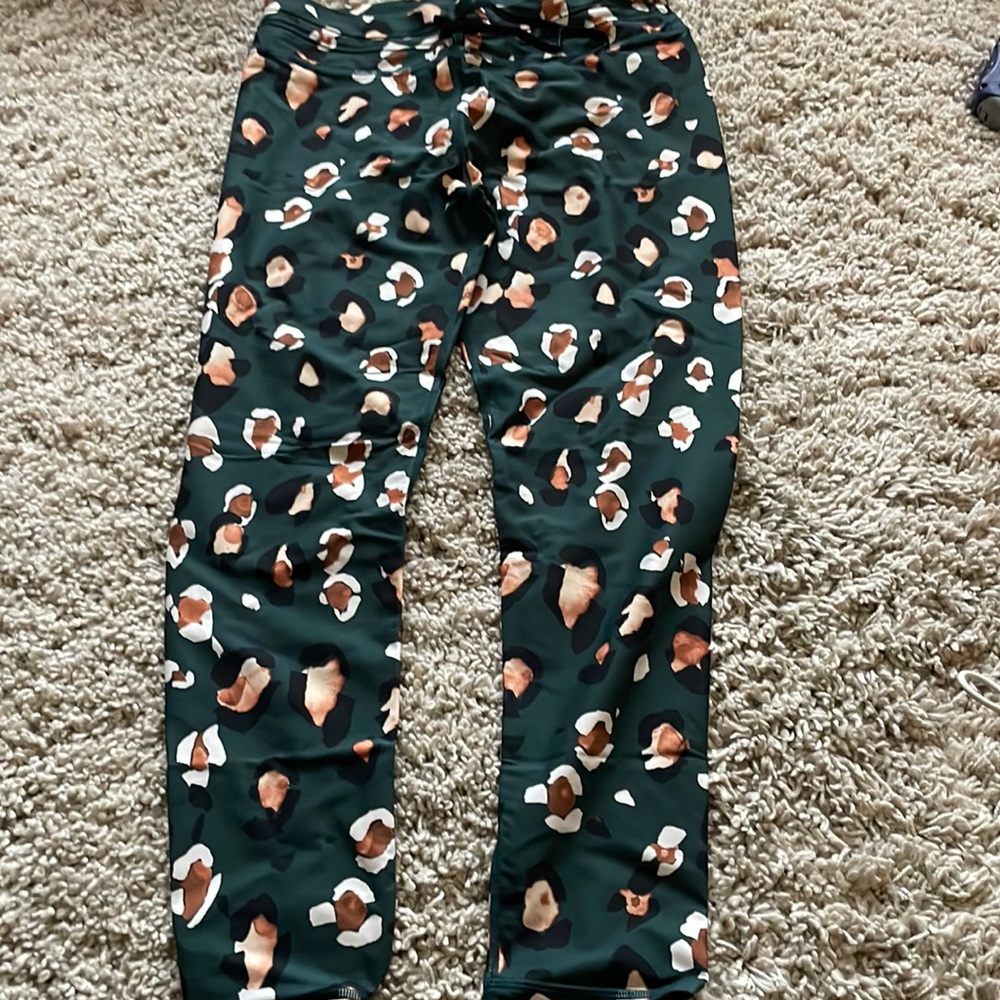 The Upside animal print emerald leggings. Worn few times. Sz large